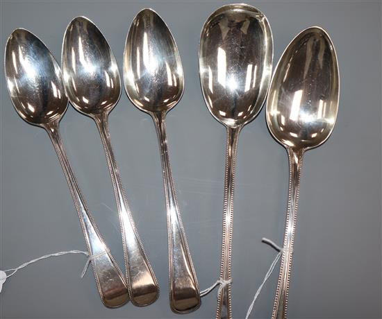 A William IV silver bead edge serving spoon, London 1834, maker Mary Chawner and four other bead edge silver spoons, approx 14oz